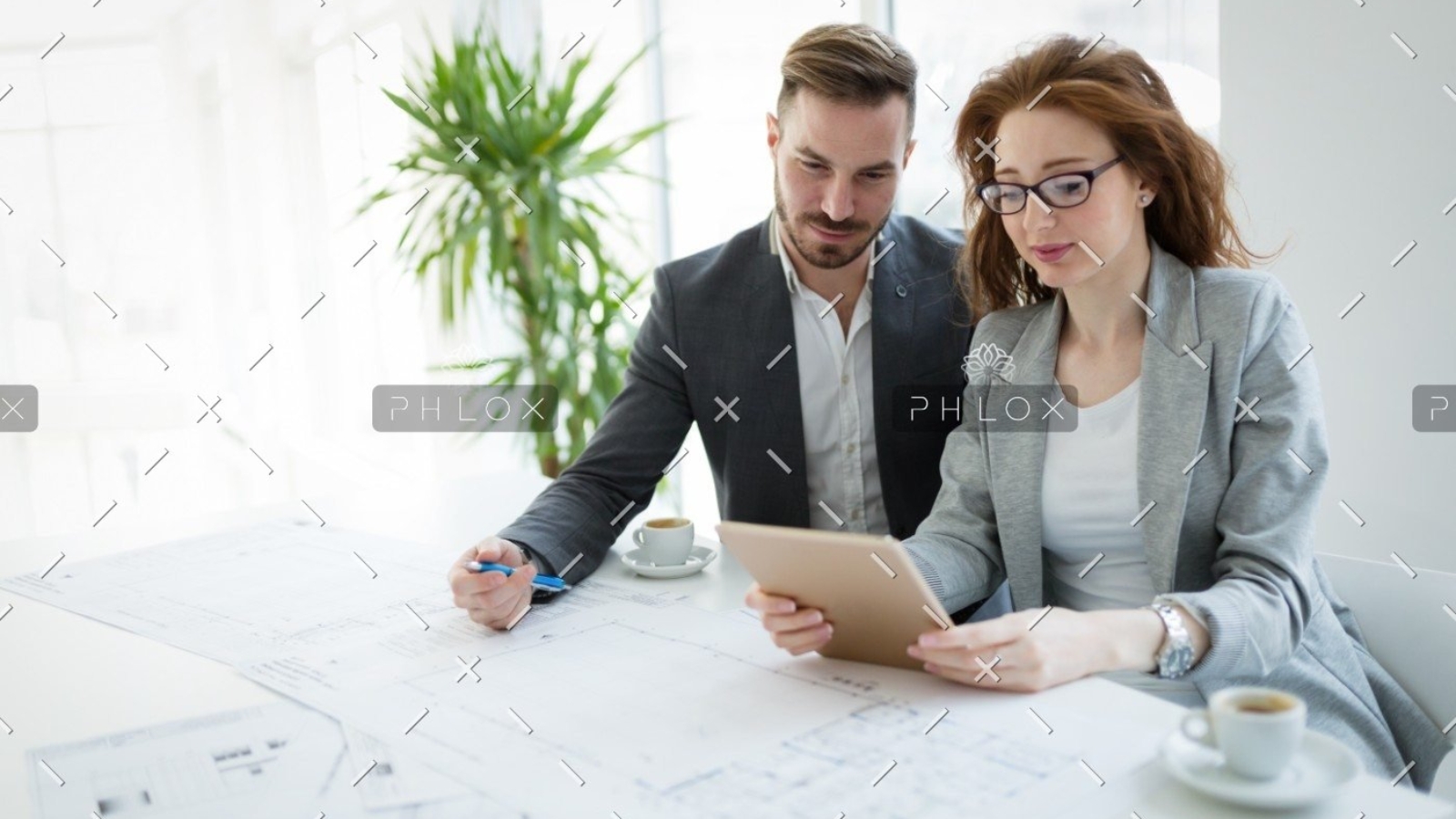 demo-attachment-877-portrait-of-young-architect-woman-on-meeting-KFZCE3A